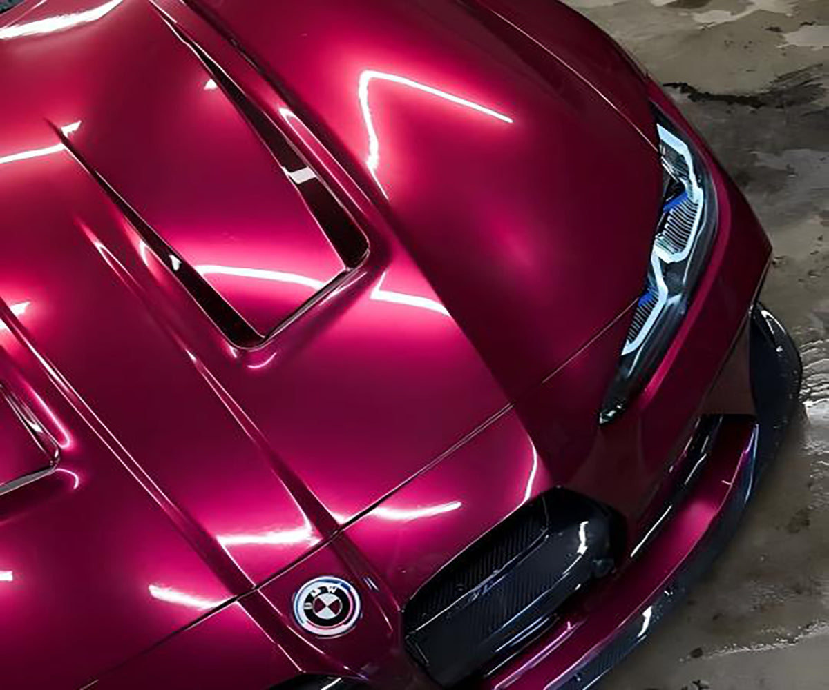 Rubellite Purple car wrap on a sports car under Australian sunlight