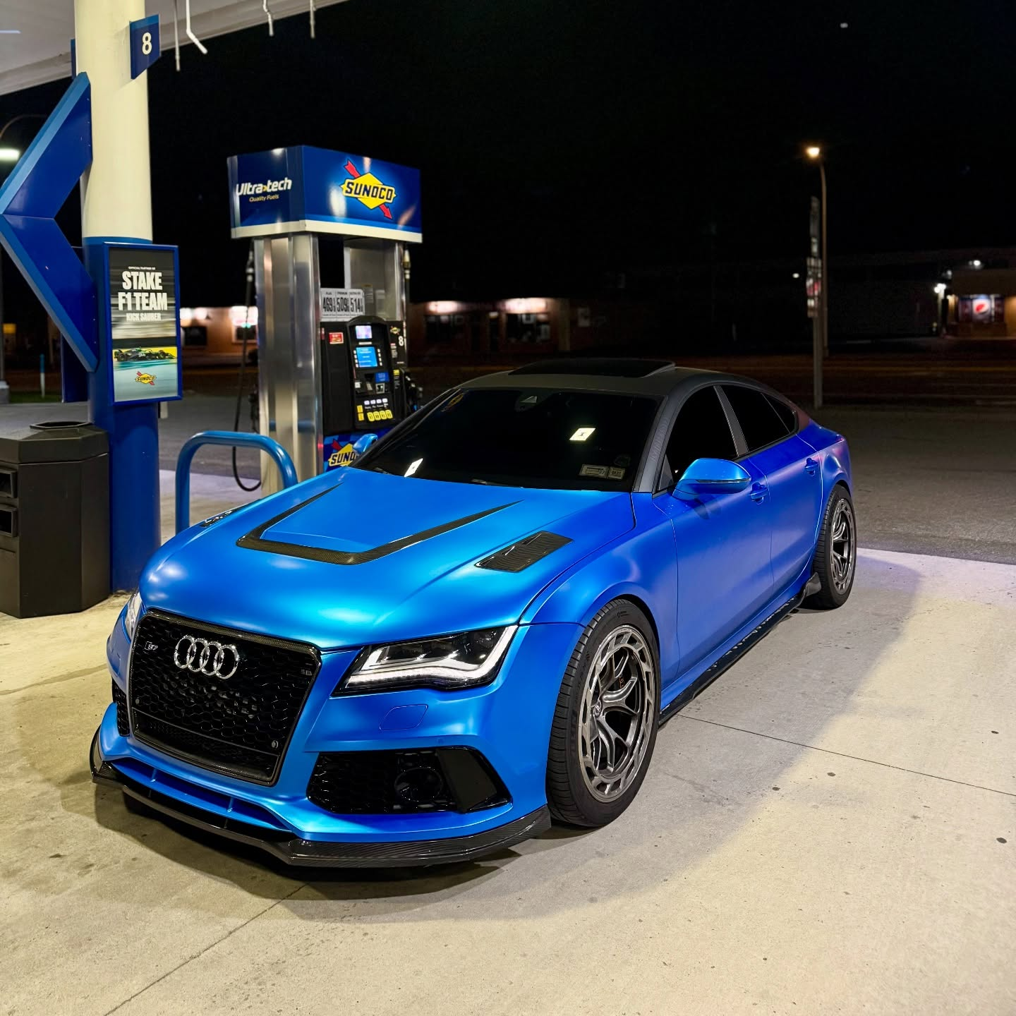 No-fade stretching of Diamond Azure Blue Car Wrap PET on complex car curves, showing zero glue lines.