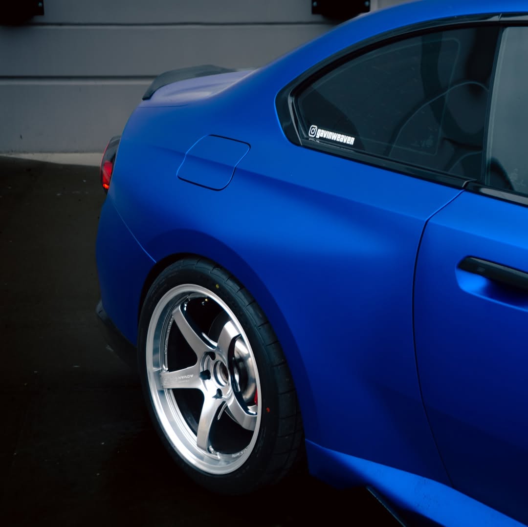 Muted metallic silk reflections on the non-reflective body contours of Matte Metallic Satin Blueberry Car Vinyl Wrap PET.