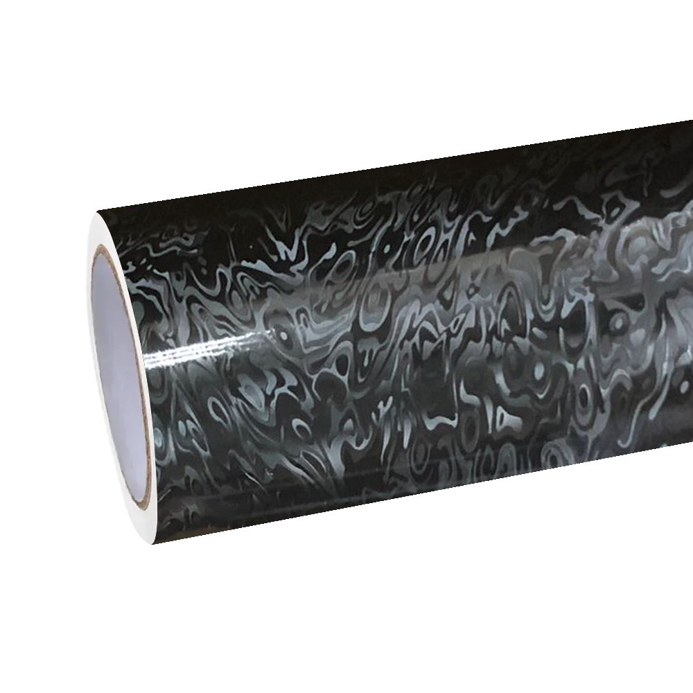 Close-up of Matte Black Car Wrap featuring Cosmic Black Car Wrap texture and premium Carbon Fiber Car Wrap finish.