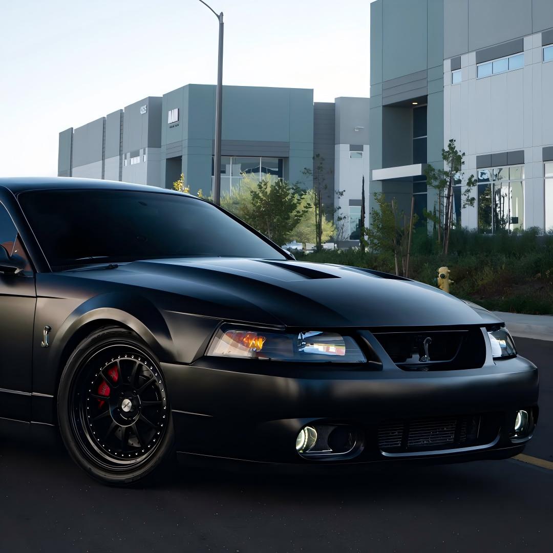 Silk-smooth satin light reflections on a car body curve wrapped in Matte Satin Black Ceramic Black Vinyl Wrap PET.
