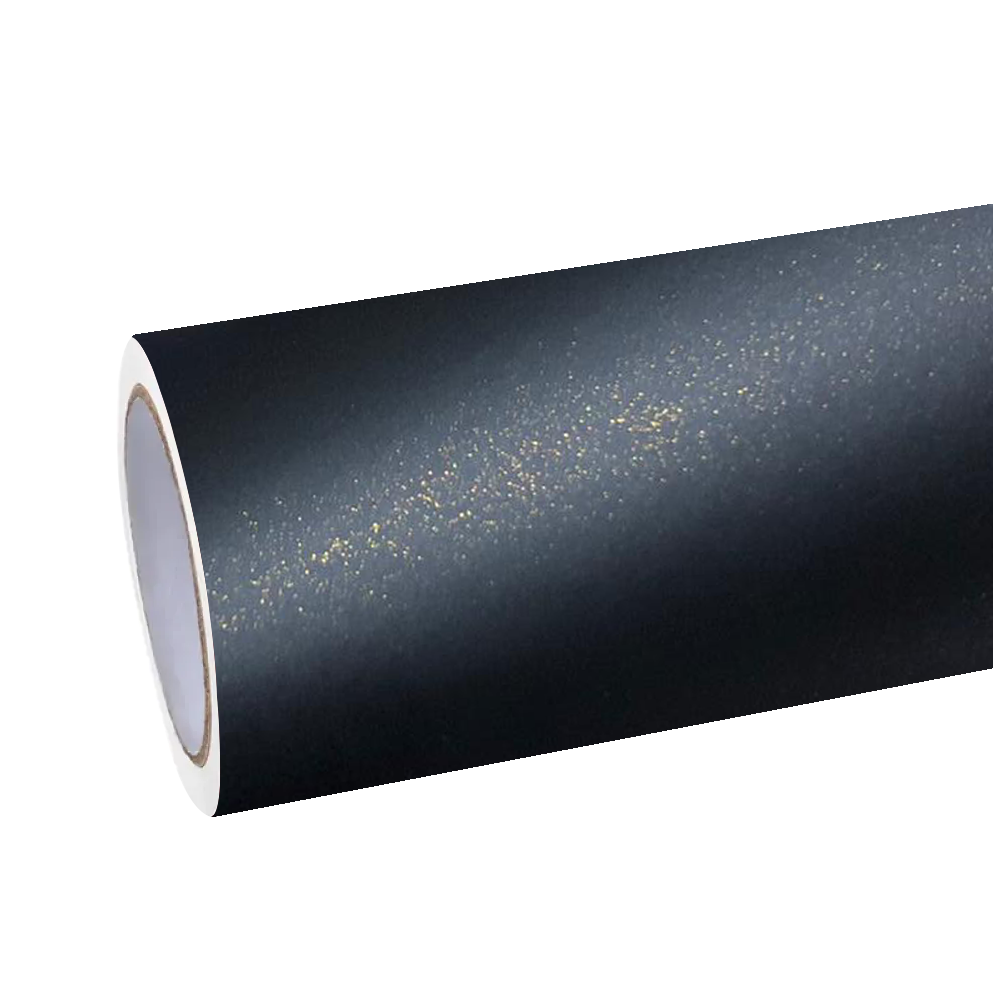 Ambient showroom spot beams illuminating the soft-focus surface of ALUKOCARWRAP black gold car wrap to reveal dense, frozen gold diamond micro-flakes.