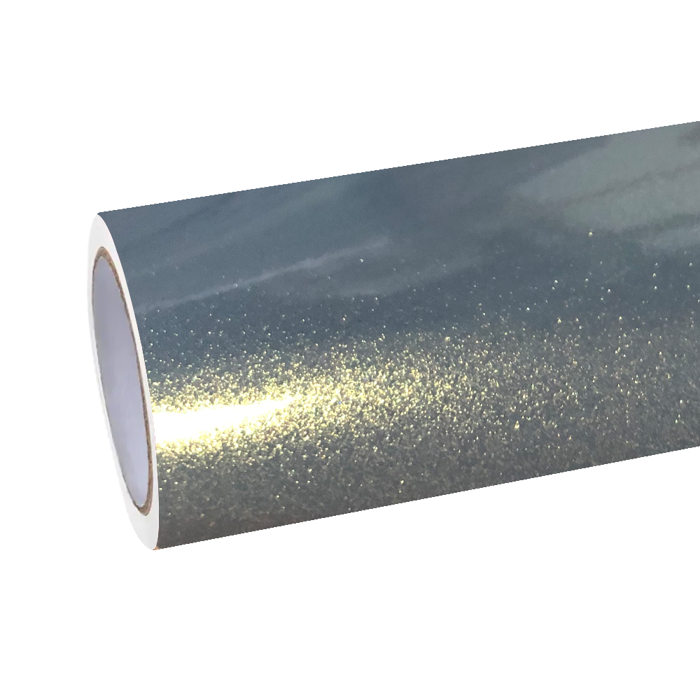 Industrial studio flash reflections dancing off the molten-champagne glow of ALUKOCARWRAP grey gold car wrap film to highlight its dense metallic diamond sparkles.