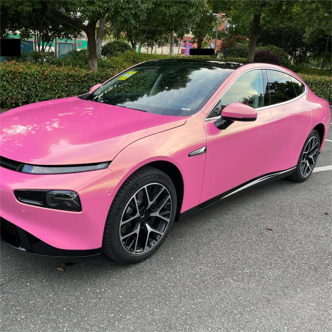 ALUKOCARWRAP gold pink car wrap on an exotic sports car, showcasing the breathtaking diamond golden-pink color shift.