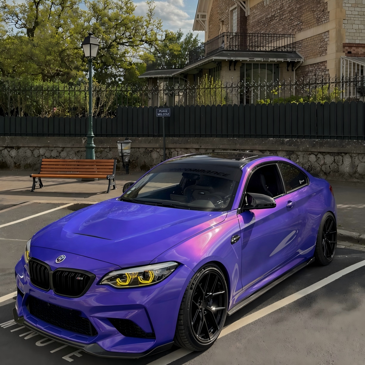 Close-up detail of a sports car fender wrapped in Metallic Purple Car Wrap, demonstrating the flawless, wrinkle-free conformability of premium PET film.