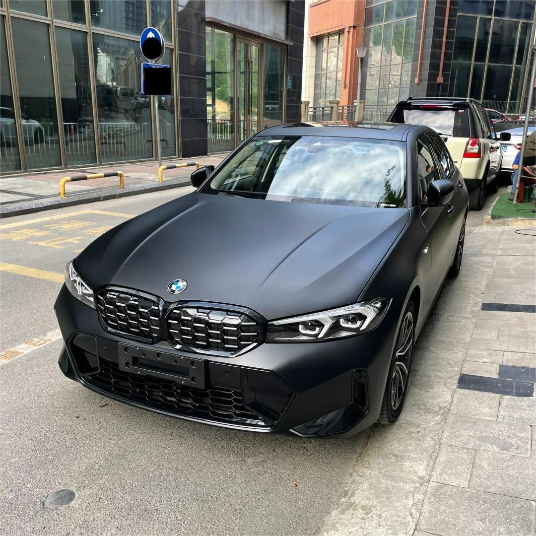 Sharp fender creases showcasing a wrinkle-free, paint-like application of ALUKOCARWRAP frosted black car wrap over complex automotive architecture.