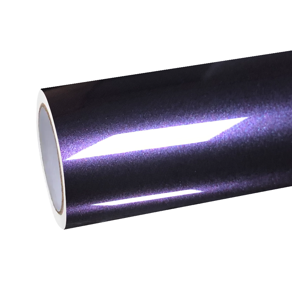 Overhead lighting reflecting off a sports car wrapped in ALUKOCARWRAP Gloss Metallic Galaxy Purple. The PET film shows sharp linear light reflections without orange peel distortions.