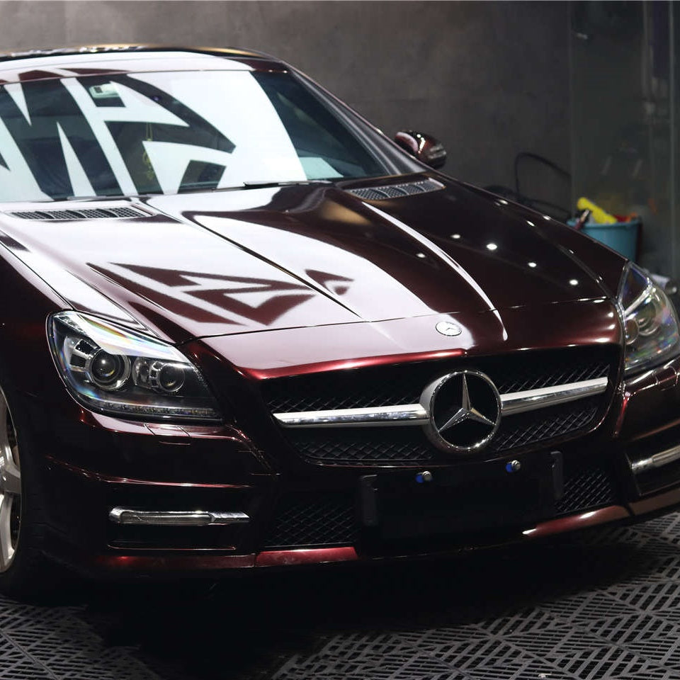 Rich wine shimmers captured on the zero-orange-peel curves of Gloss Metallic Black Rose Car Vinyl Wrap PET.