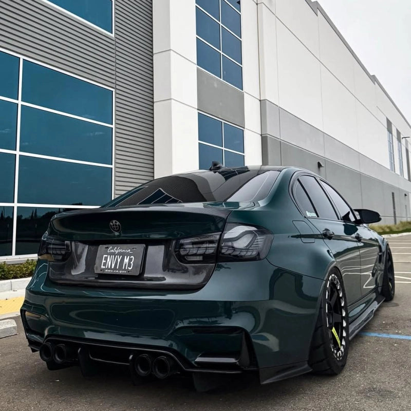 Close-up of gloss Mohsen Green car vinyl wrap PET texture, highlighting the rich forest undertones and high-gloss surface reflection.