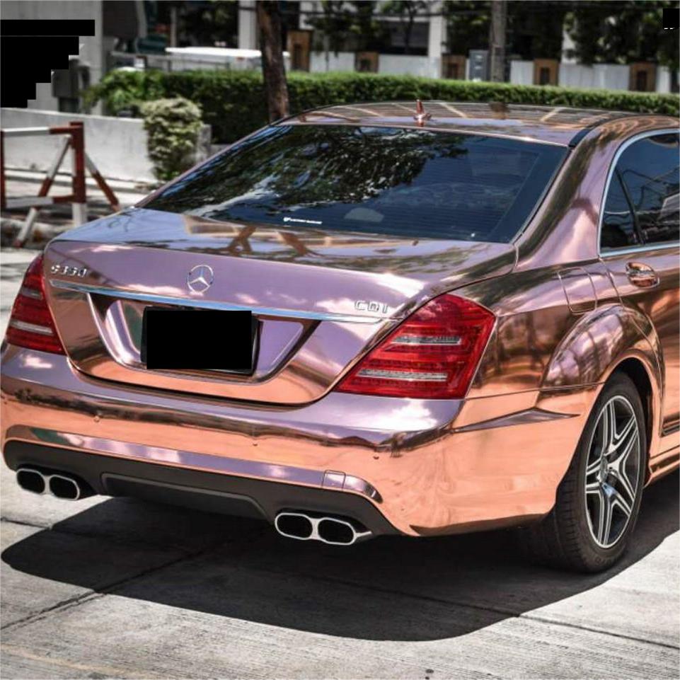 Flawless liquid metal reflections on a fender wrapped in Gloss Mirror Chrome Rose Gold Car Vinyl Wrap material.