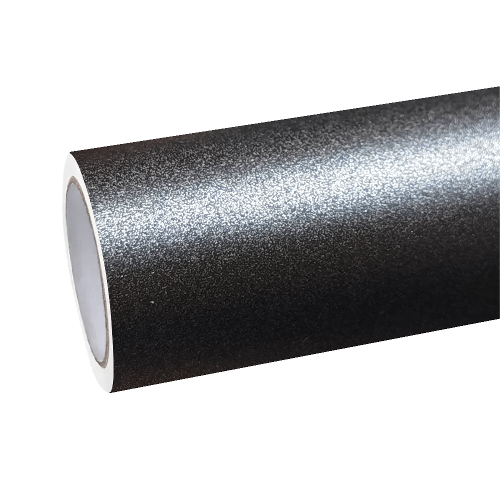 Harsh warehouse beams completely absorbed by the zero-orange-peel obsidian depth of ALUKOCARWRAP frosted black car wrap PET film.