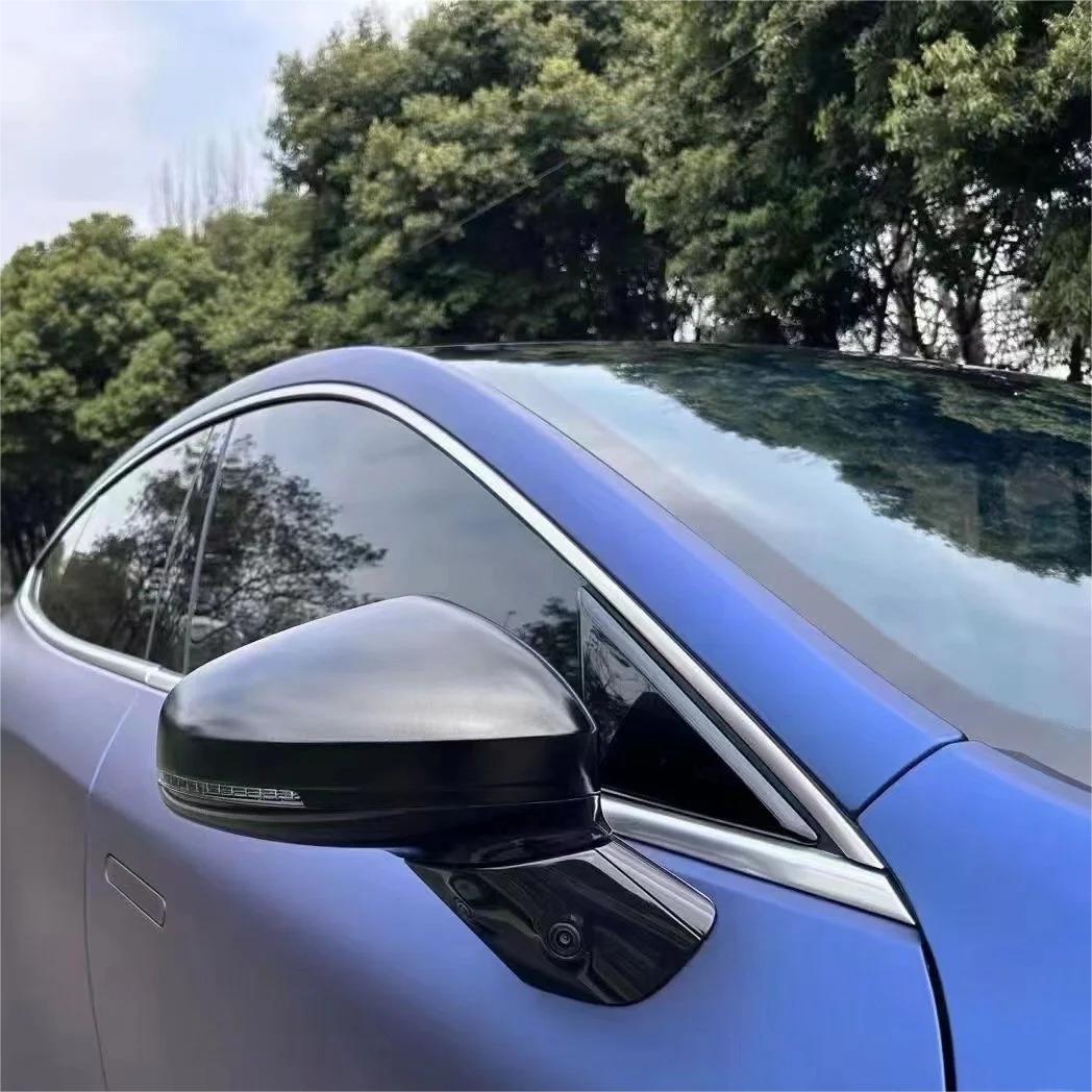 Soft semi-gloss reflections on a car door panel wrapped in Matte Metallic Satin Dark Blue Car Vinyl Wrap material.