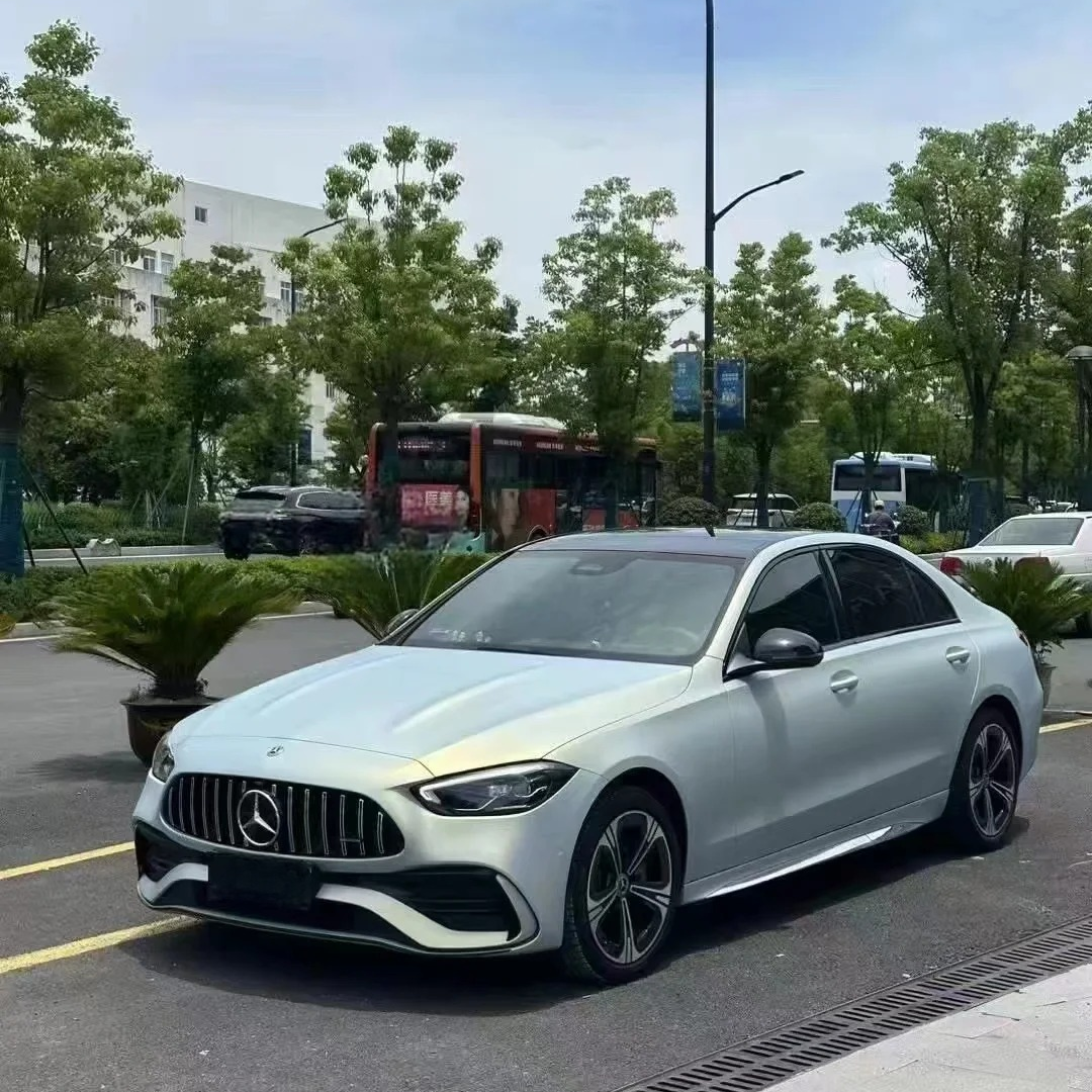 ALUKOCARWRAP Matte Chameleon Gold Blue Car Vinyl Wrap on a sports sedan, showcasing dual-tone desert gold and aurora blue shift.