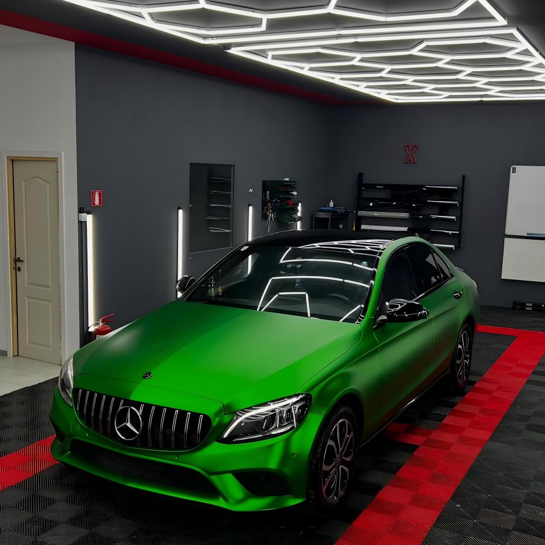 ALUKOCARWRAP Matte Chrome Green Car Vinyl Wrap on an exotic coupe, showcasing luxurious satin metallic liquid forest tones.