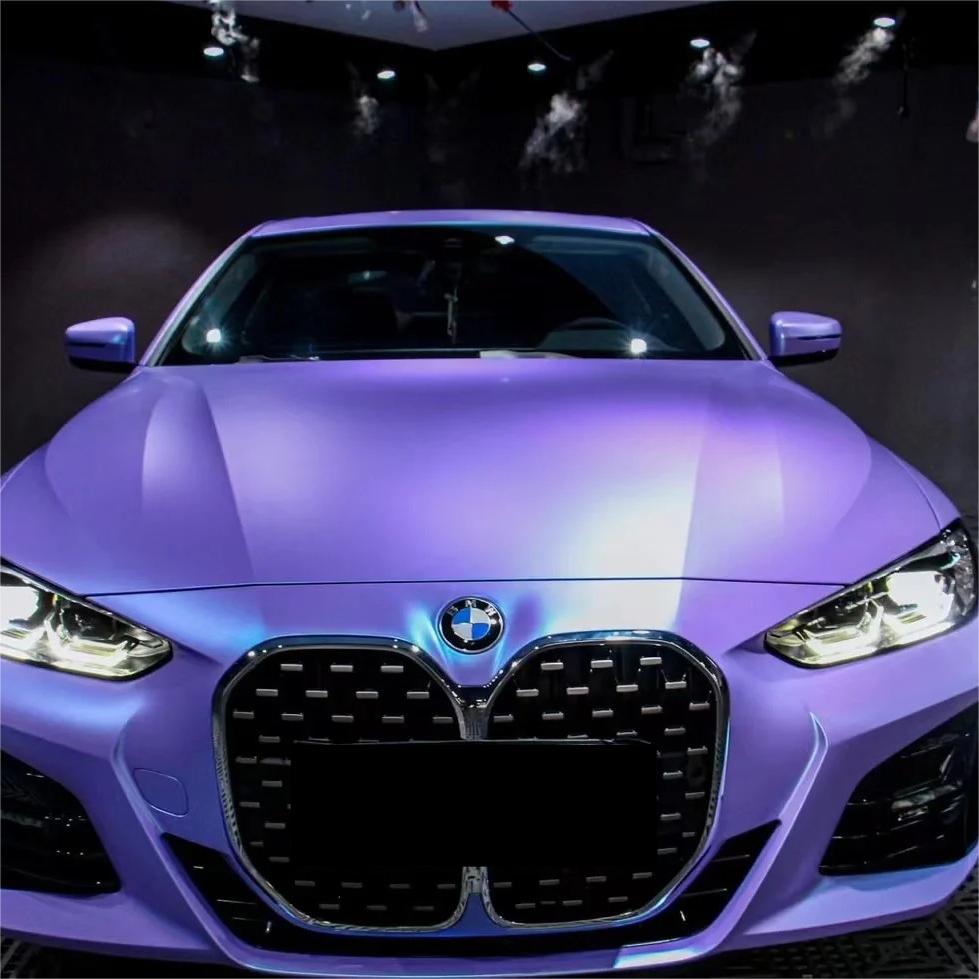 ALUKOCARWRAP Purple Blue Car Wrap mimicking a haute-couture matte mist over the elegant rounded fenders of a luxury EV.
