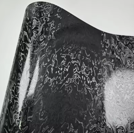 Premium PET Meta Black Car Wrap with a sleek Matte Black Car Wrap texture and realistic carbon fiber pattern.