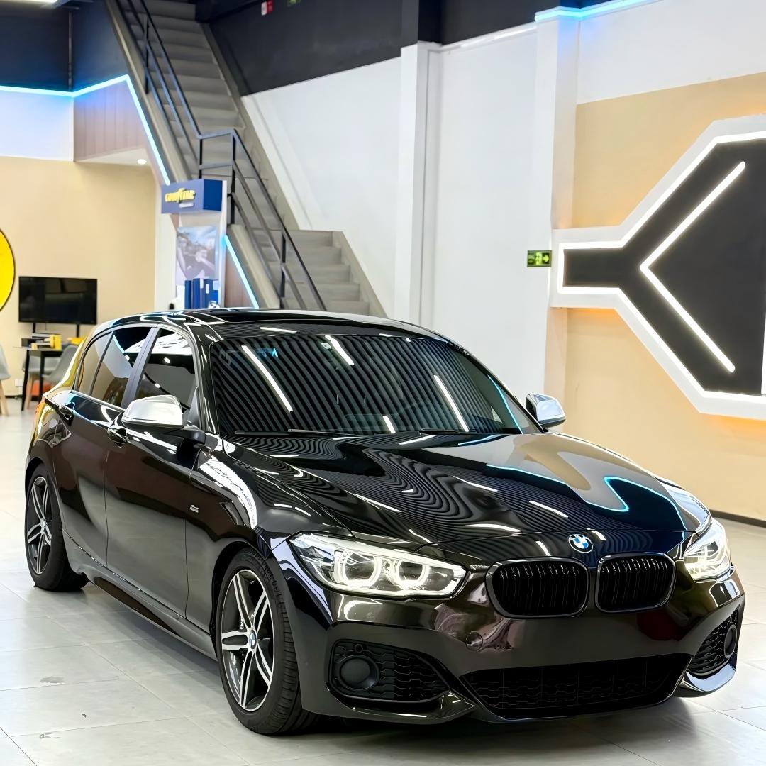 Full car showcase with Gloss Black Car Wrap showing wet look mirror shine and zero orange peel.