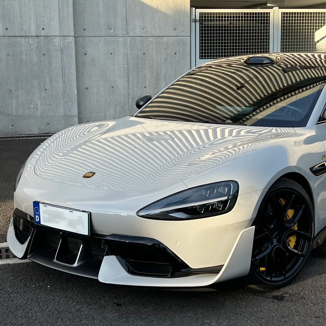 Installing cream grey car wrap vinyl on a vehicle body panel, highlighting the easy-to-apply metallic grey wrap texture.