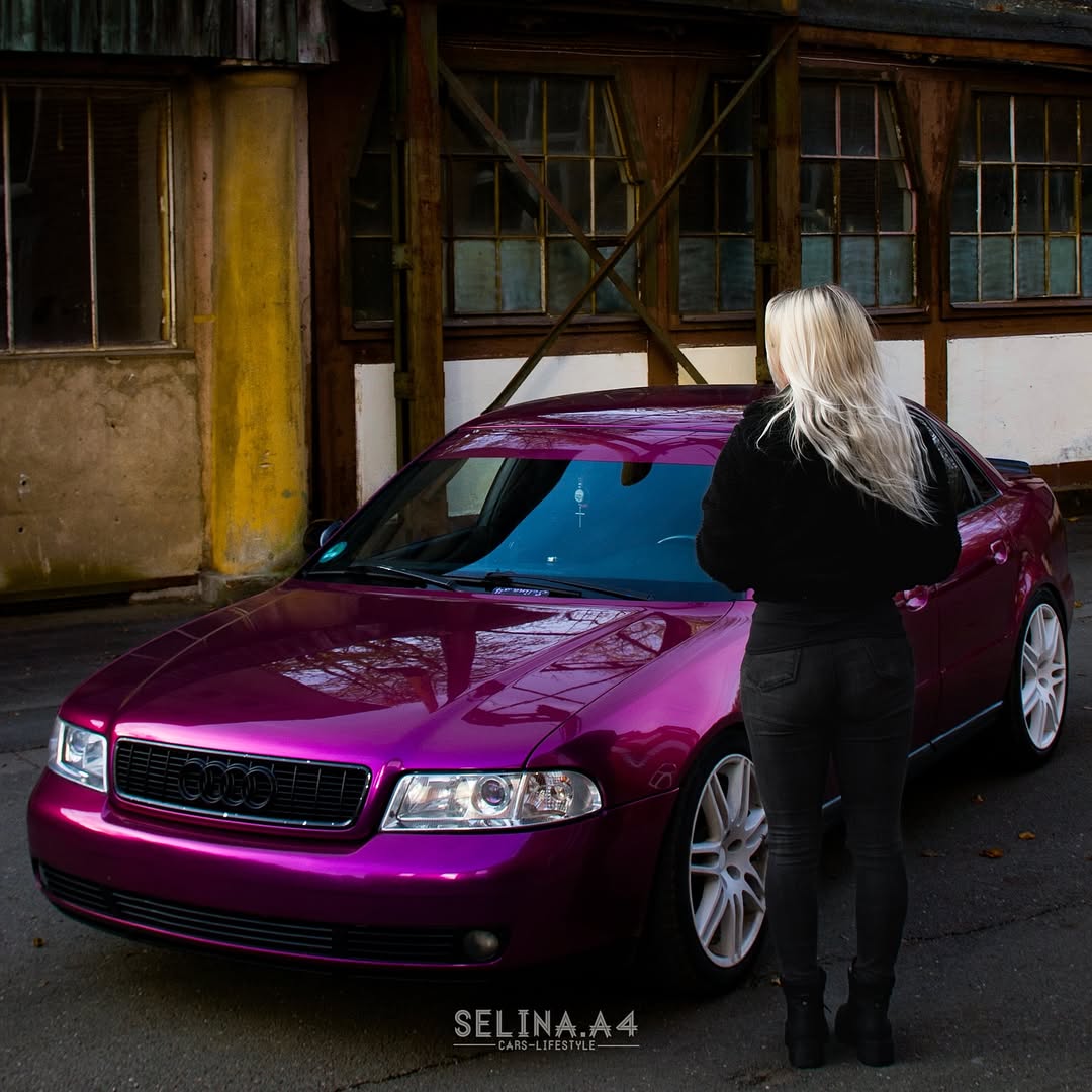Sunlight view of ALUKOCARWRAP metallic purple car wrap displaying deep optical clarity and dense metallic flake reflections.