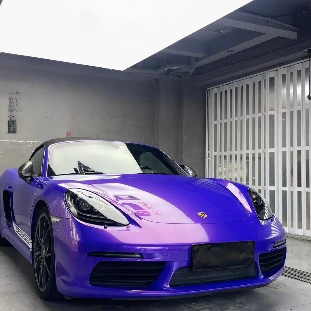 Complete car wrap transformation featuring a dramatic Royalty Purple Car Wrap finish, exhibiting a liquid-like, deep gloss metallic shade.