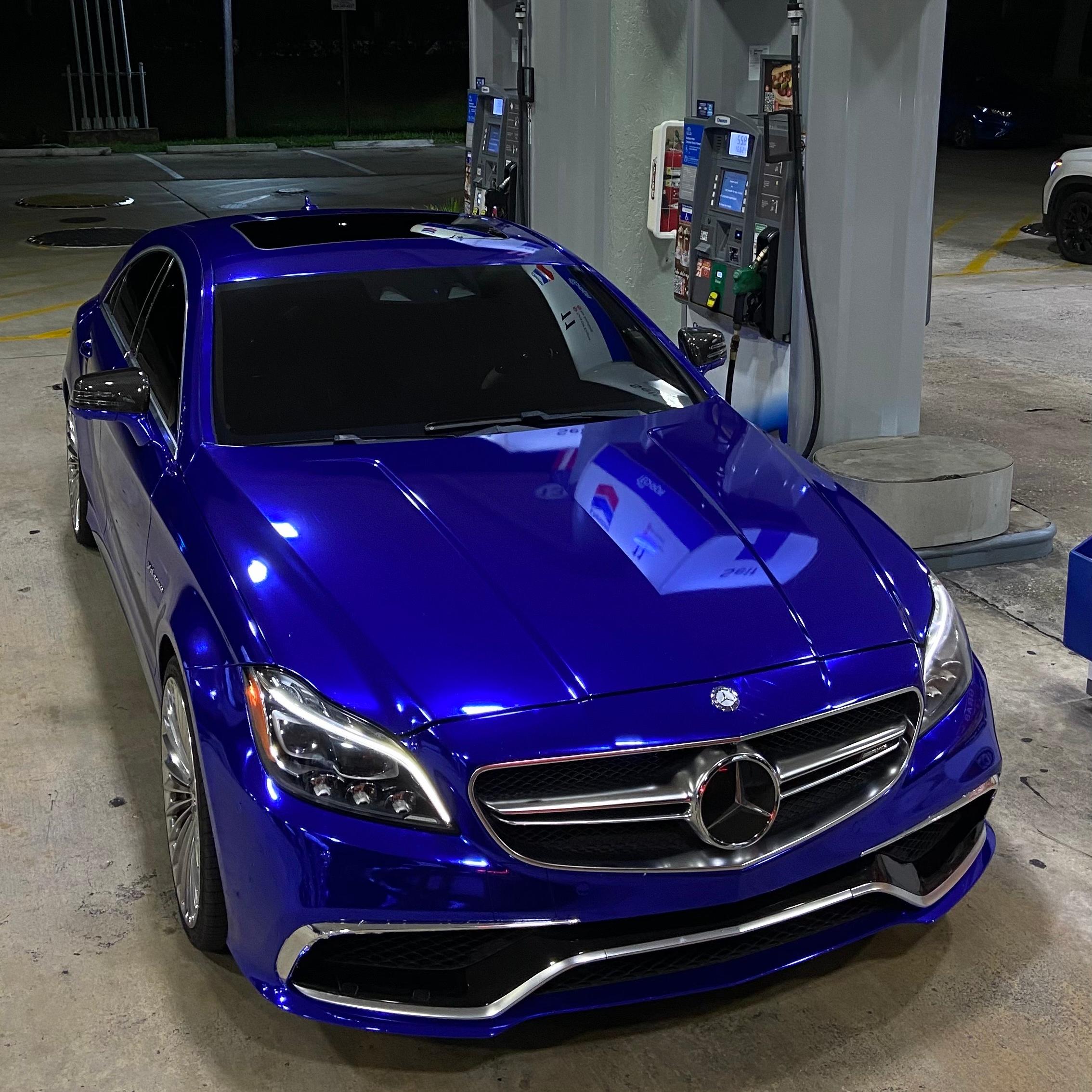 High-fidelity liquid sapphire glow on a car hood wrapped with ALUKOCARWRAP premium PET Gloss Chrome Car Wrap vinyl.