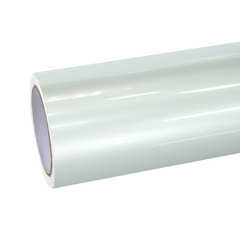Unrolling a pristine roll of ALUKOCARWRAP Gloss Liquid Mousse White Car Vinyl Wrap PET, showcasing its smooth porcelain-like raw material.