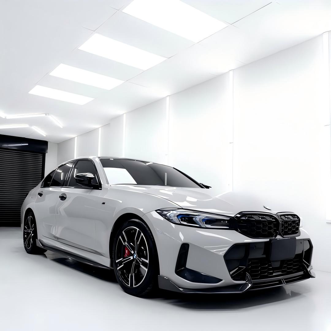 High-angle shot of a custom car fully wrapped in ALUKOCARWRAP Gloss Light Nardo Grey Car Vinyl Wrap PET, displaying clean, modern OEM lines.