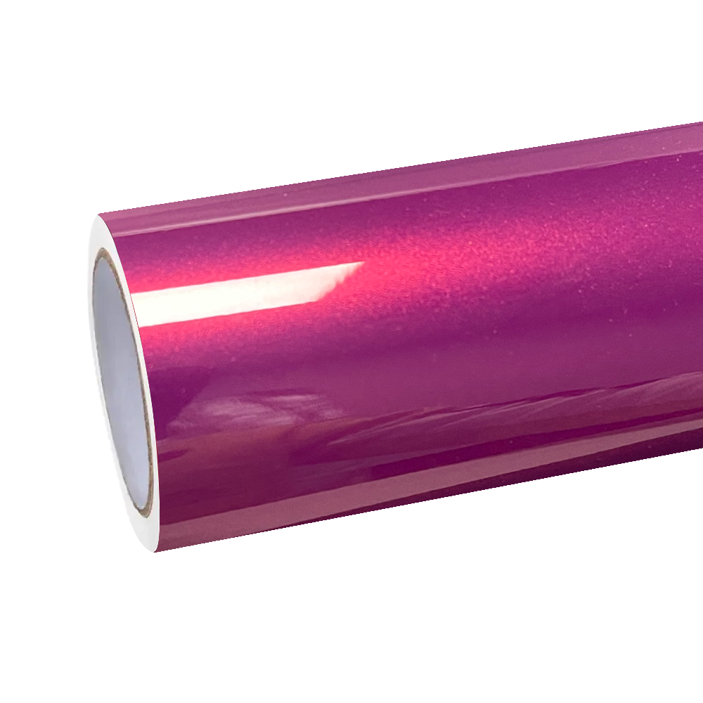 A pristine roll of ALUKOCARWRAP pagoda red car wrap with PET backing, displaying premium ruby metallic paint flakes.