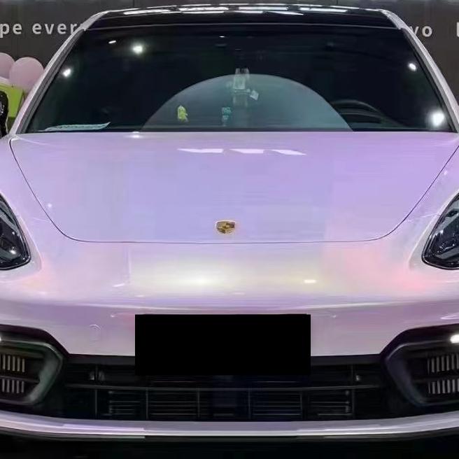 A custom sports car transformed by ALUKOCARWRAP. This vibrant Gloss Pink Car Wrap delivers a sleek, modern aesthetic that stands out on the road.