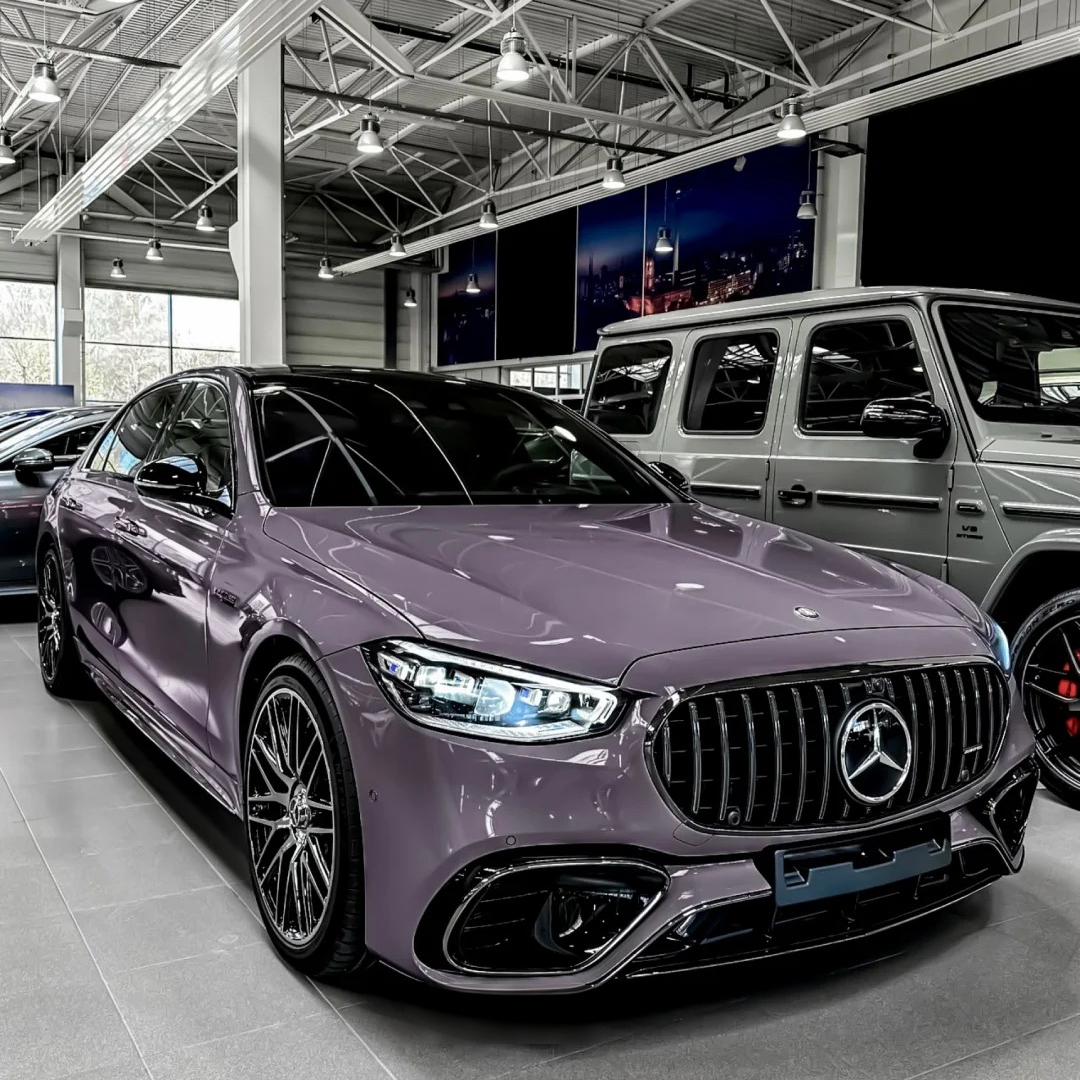 A minimalistic vehicle profile layered in Lavender Purple Car Wrap against a raw concrete architectural background, contrasting organic lavender pastel tones with industrial grey textures.