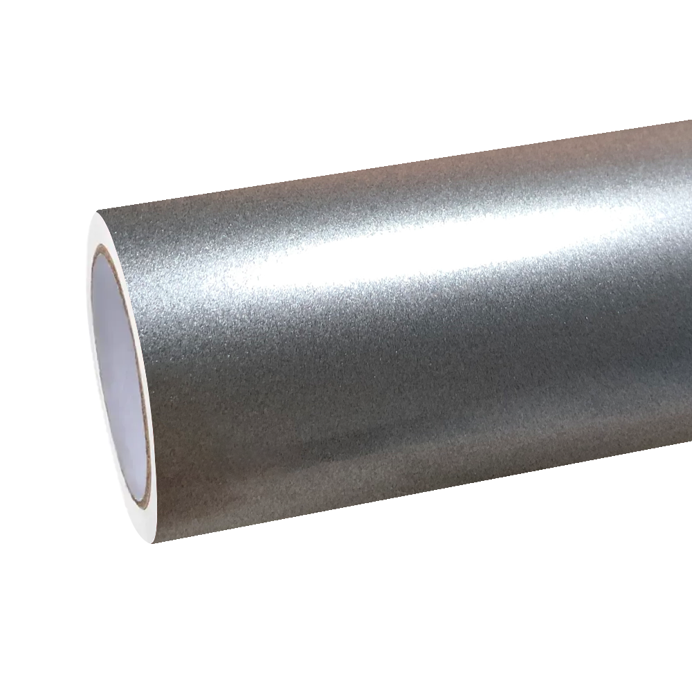 ALUKOCARWRAP Skyscraper Grey vinyl film catching linear reflections of urban glass buildings, defining its liquid gloss finish.