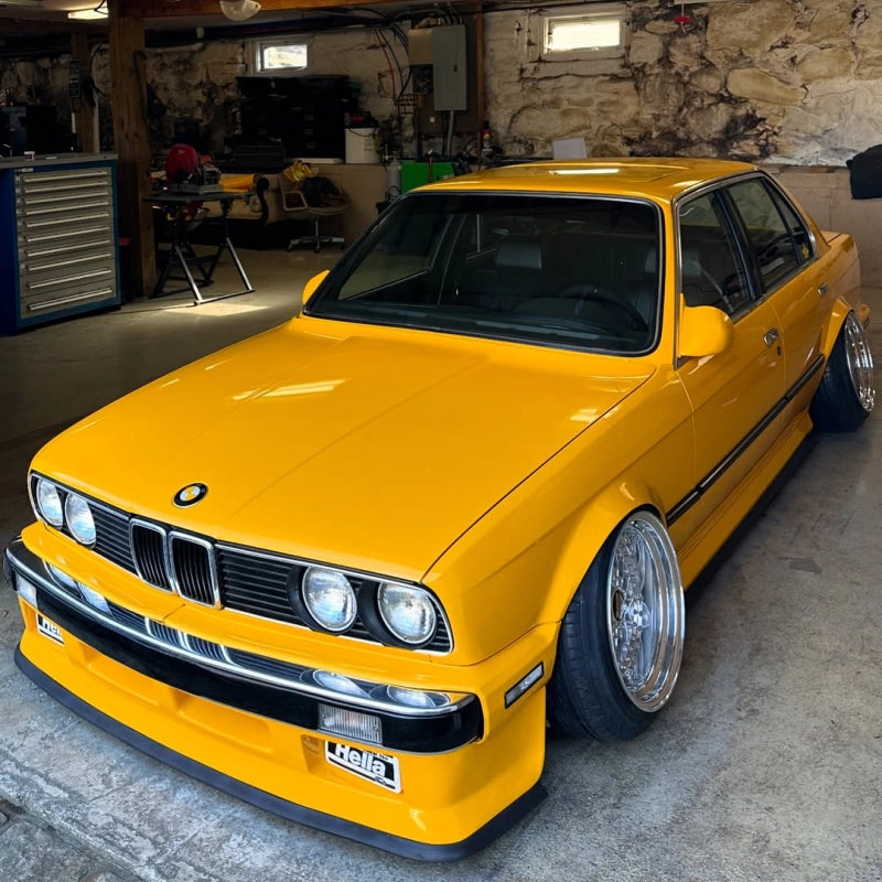Full vehicle wrap with gloss sunflower yellow car vinyl wrap PET, showing premium mirror finish and vibrant color transition. By ALUKOCARWRAP.