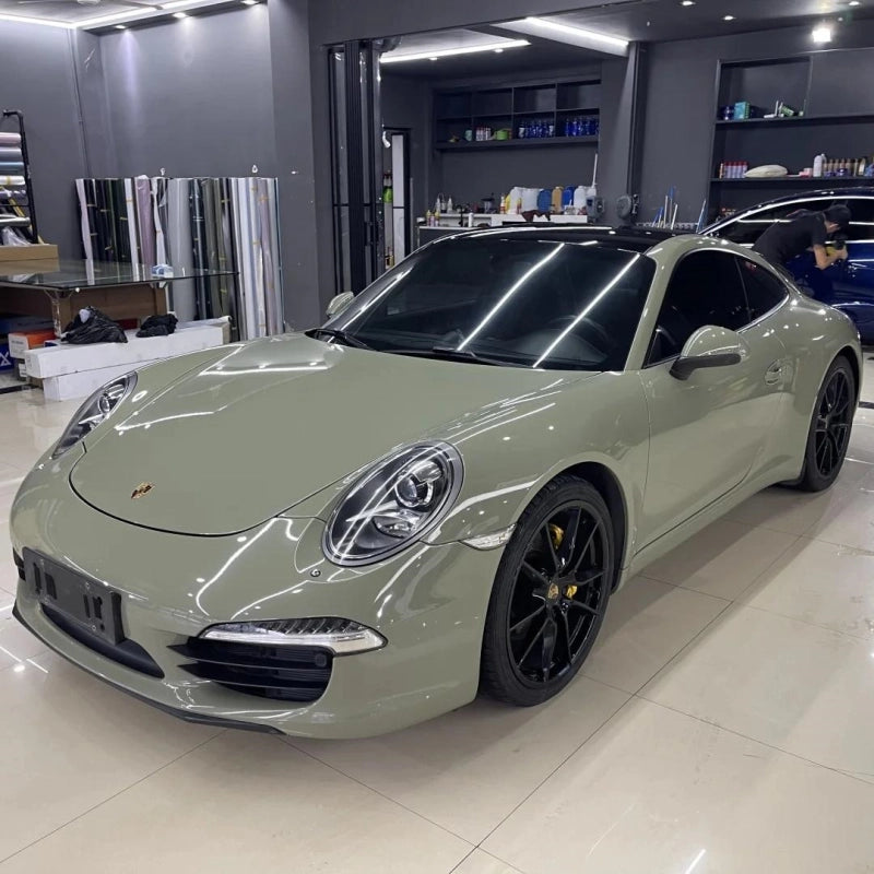 Adventure SUV fully protected with Aluko super glossy Khaki Green car vinyl wrap PET, exhibiting a high-reflective water-like shine.