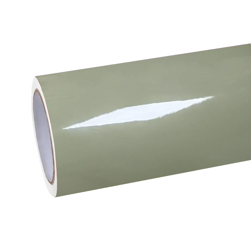 A roll of Aluko super glossy Khaki Green car vinyl wrap PET sheeting, showcasing the smooth liner for high-end installers.
