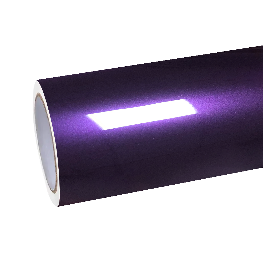 Stripping the clear protective cap off the ALUKOCARWRAP Gloss Metallic Twilight Purple PET vinyl, revealing a wet-look mirror sheen.