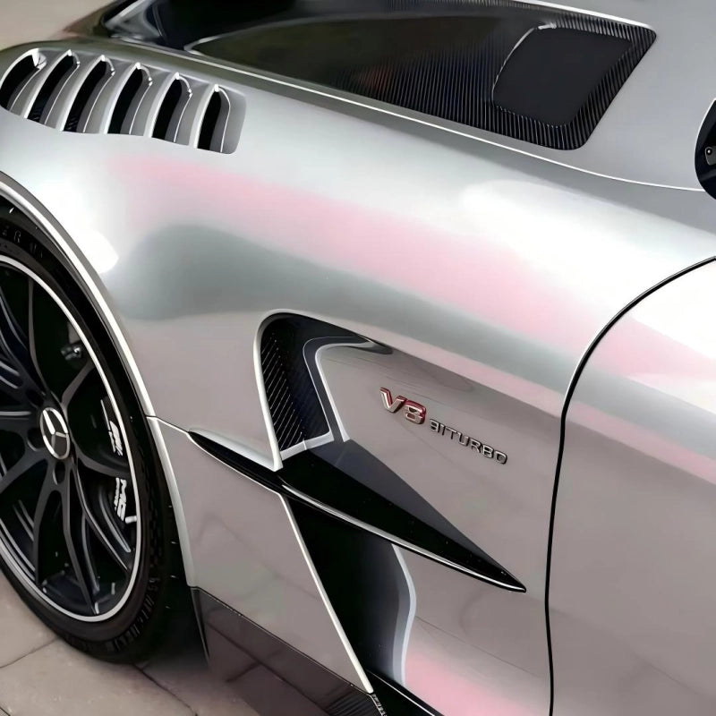 Detailed angle of ultra gloss metallic chameleon Silver Sunset Pink car vinyl wrap PET, highlighting the liquid silver to pearlescent pink glow.