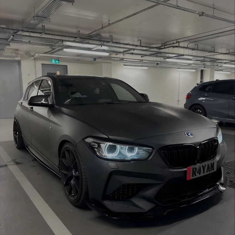 Premium BMW sport sedan featuring a seamless installation of ultra matte black car vinyl wrap with PET liner.