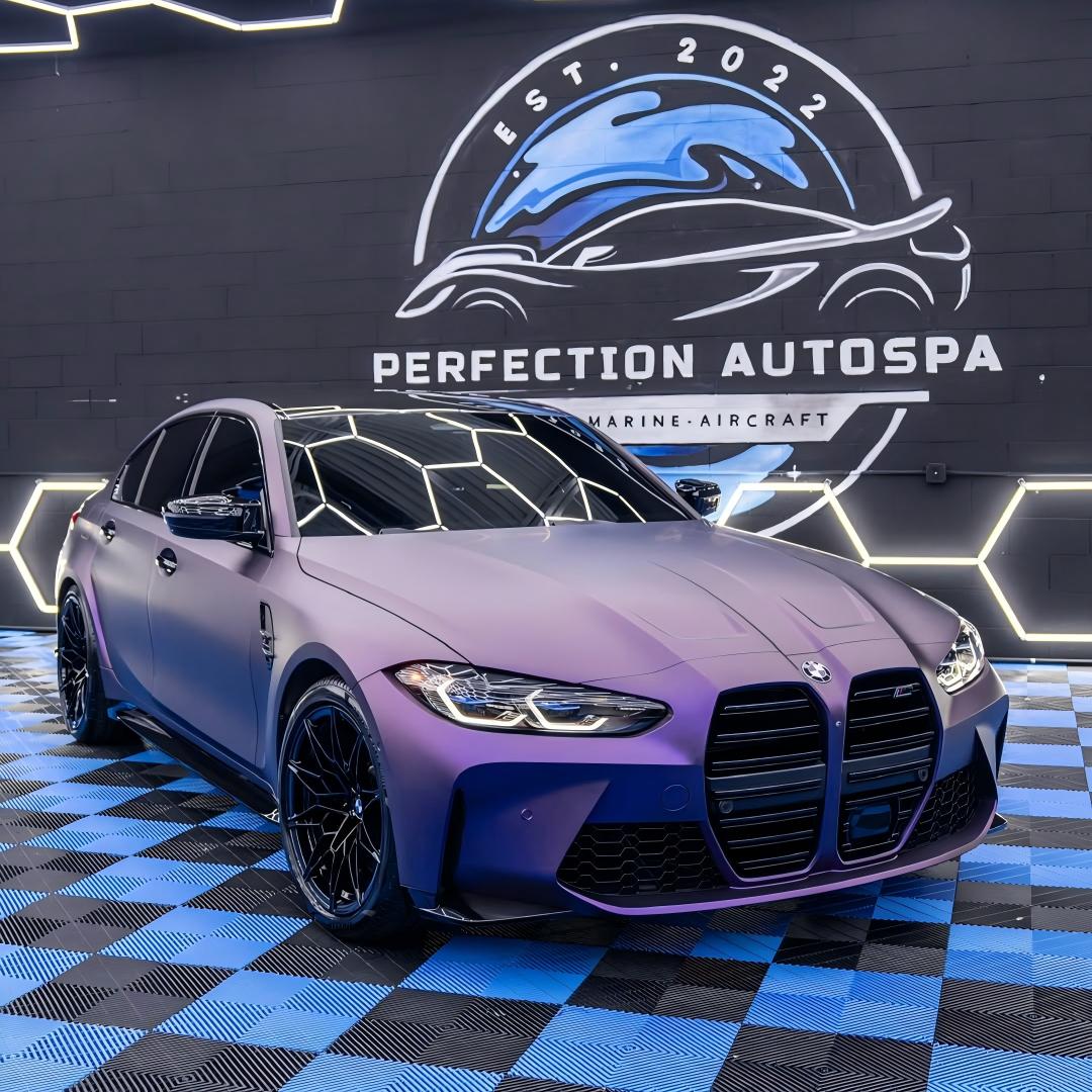 A stealth muscle car wrapped in Ultra Matte Metallic Dark Purple Car Vinyl Wrap PET, showing non-reflective nebula tones.