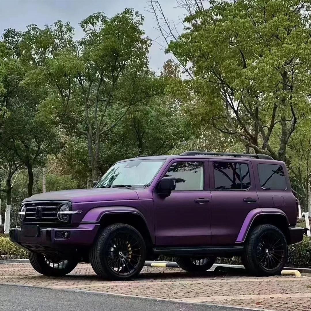 A stealth coupe wrapped in Matte Magic Russian Violet Purple Car Vinyl Wrap PET, showing dark velvet shifting tones.