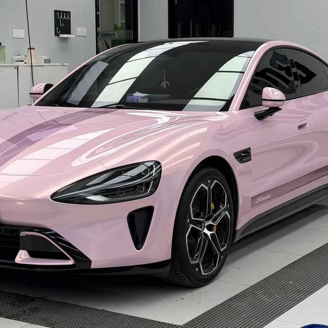 Luxury sports car wrapped in ALIKOCARWRAP Gloss Liquid Champagne Pink Car Vinyl Wrap PET, showing high-gloss metallic finish.