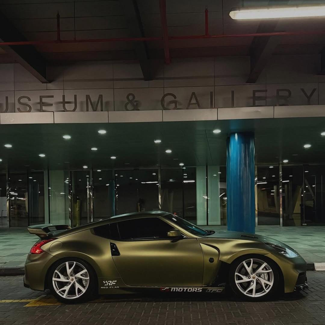 Matte Metallic Lighting Green Car Wrap under night lighting