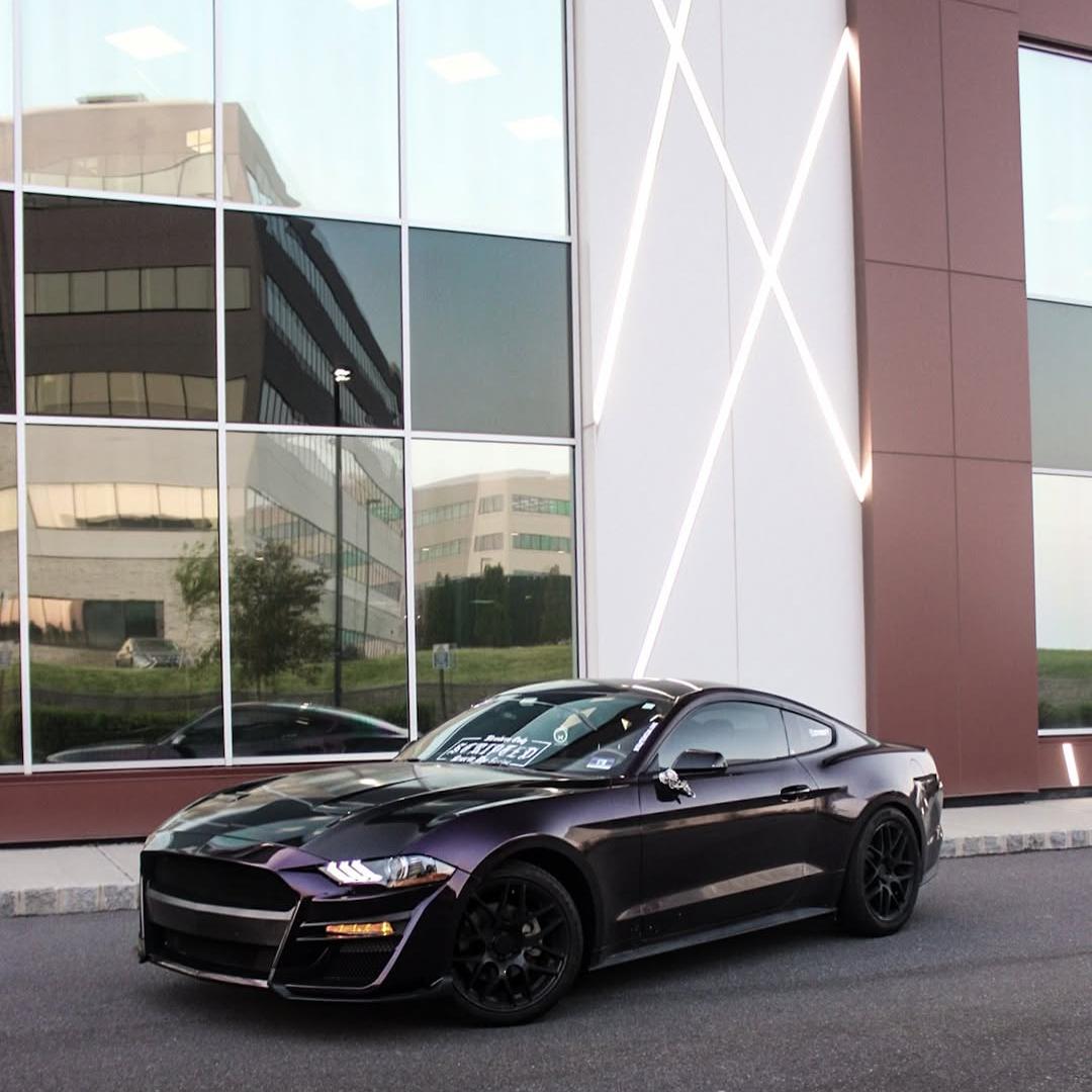 Metallic Midnight Purple Car Wrap showing its gloss finish in sunlight