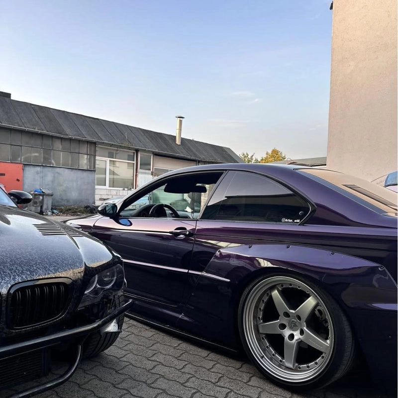 Close viewpoint of midnight purple gloss metallic car vinyl wrap BMW PET, capturing the intense metallic flake reflection.